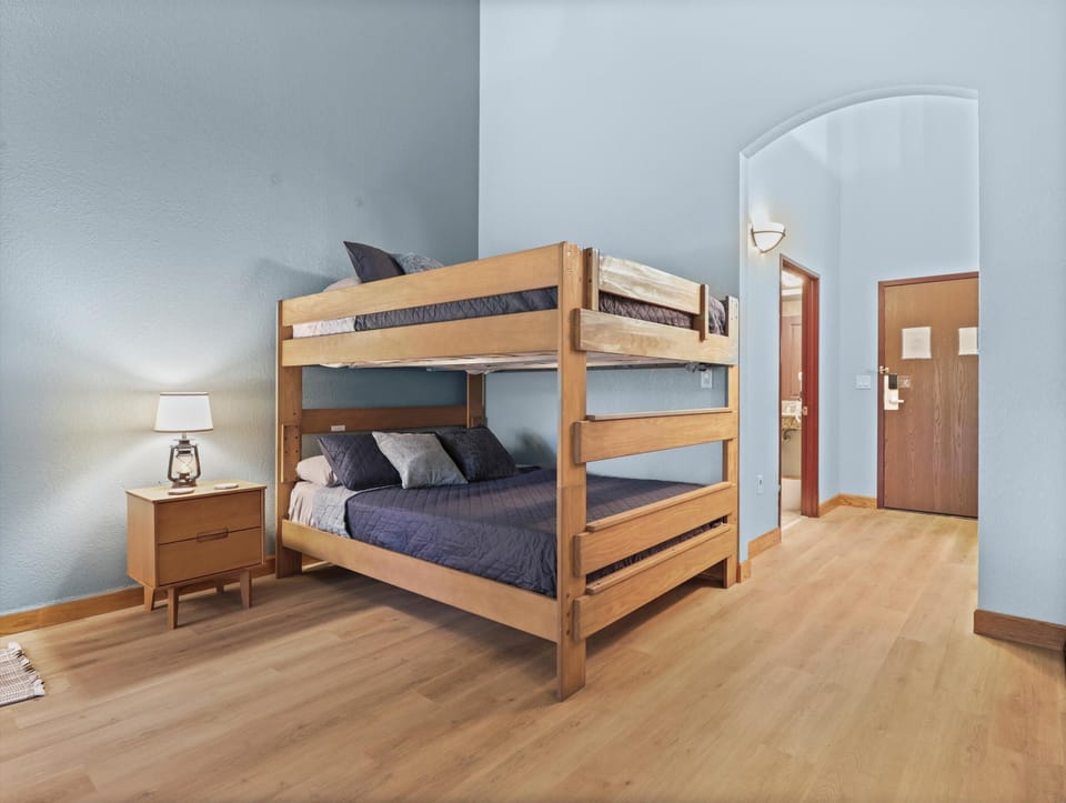 Very open room with queen bunk beds