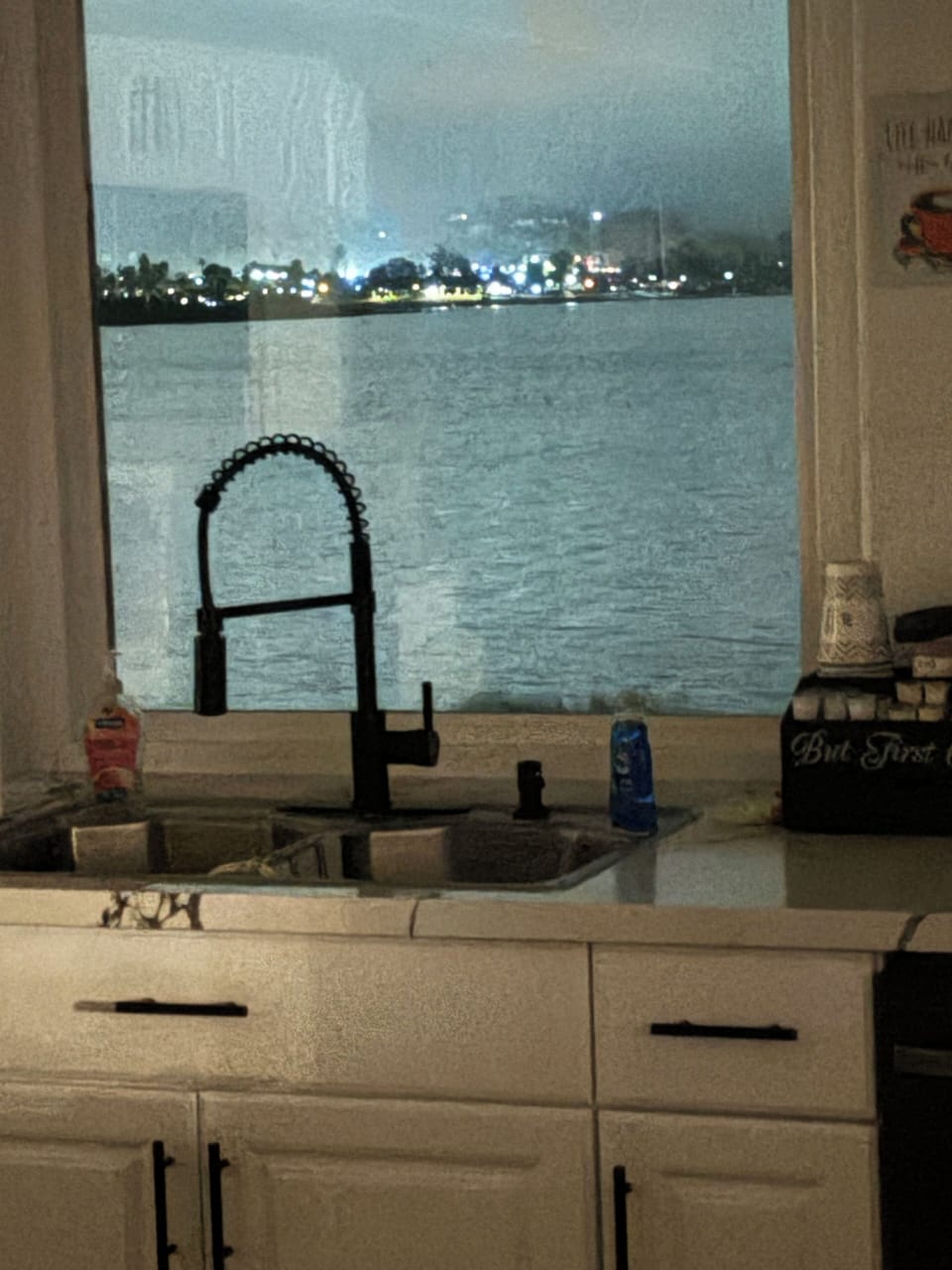 Kitchen window view at night