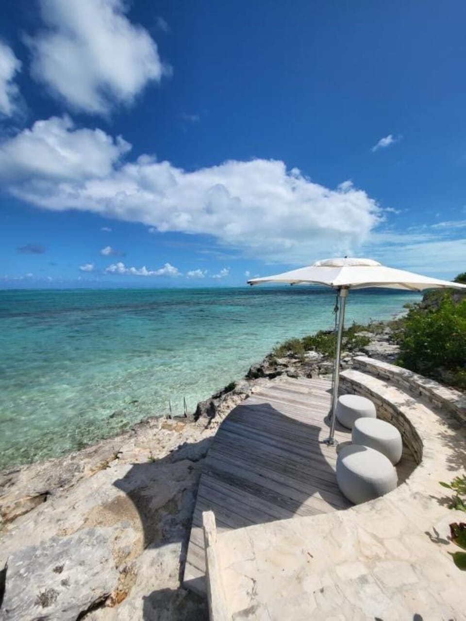 Breathe in turquoise horizons from your intimate oceanfront perch.