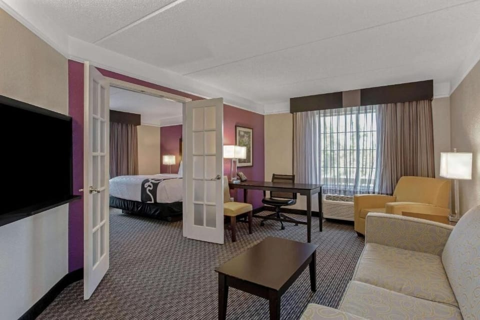 Stretch out in the spacious sitting area beside sunny windows.