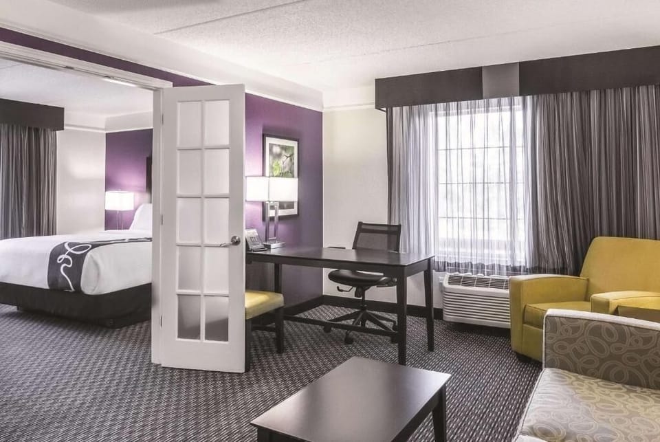 Settle in with a roomy workspace and relaxing seating nearby.