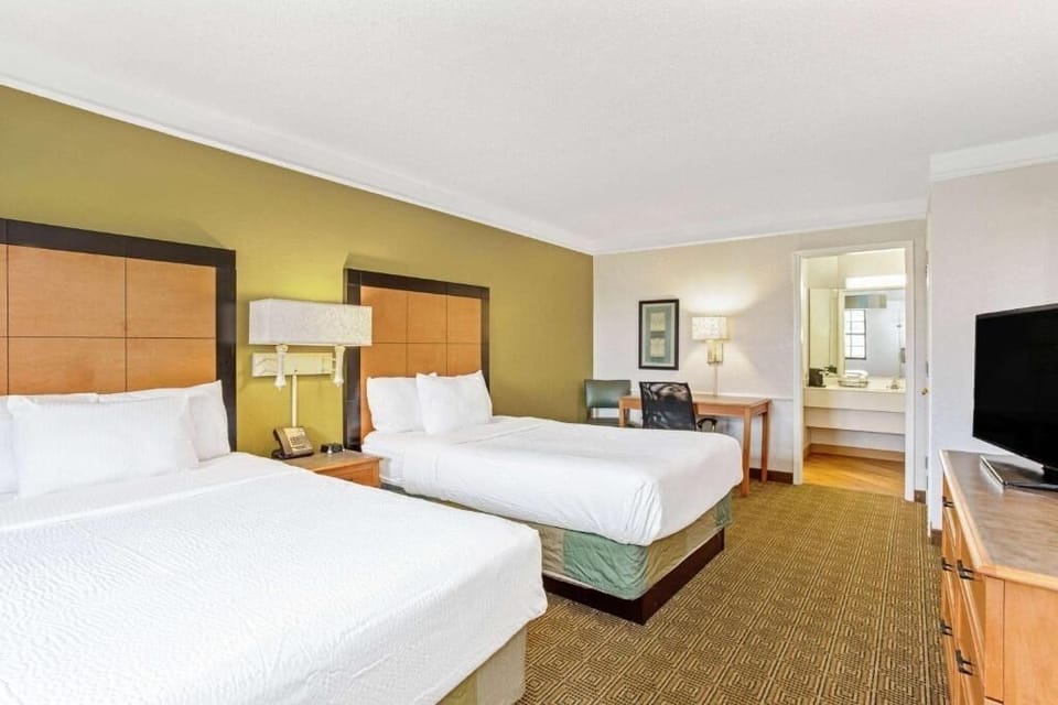 Get ready with ease near the vanity and seating area.