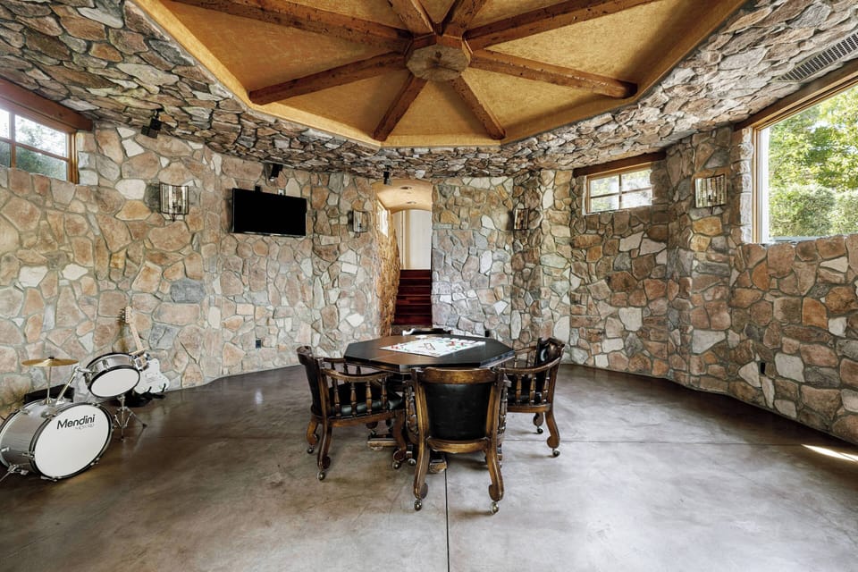 Game Room in the East Tower with TV and Patio
