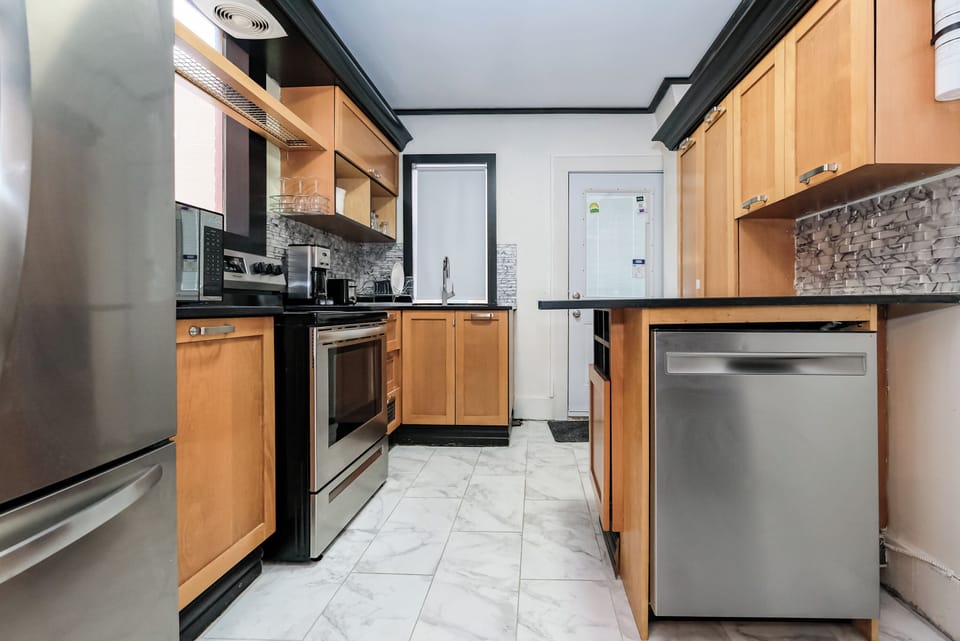 The kitchen is stacked with the latest appliances.