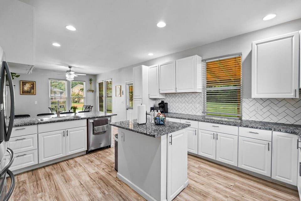Kitchen | Spacious with granite counters, stainless steel appliances, and center island