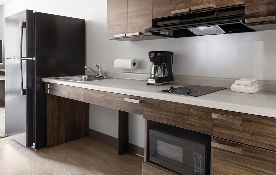 Enjoy extra counter space for snacks, coffee, and easy prep.