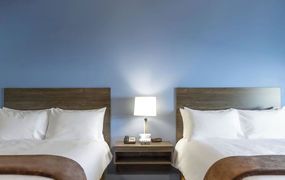 Unwind between crisp linens and soft, hotel-style comfort.