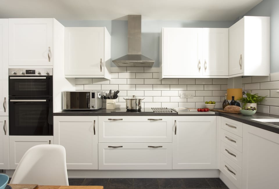 Puffin Way, Lelant. Ground floor: Kitchen with an electric oven, induction hob, television, microwave, dishwasher, filter coffee machine, fridge/freezer.