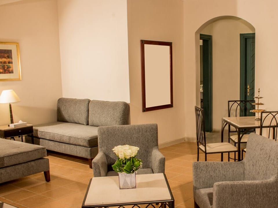 Relax on plush sofas and settle into a calm evening.