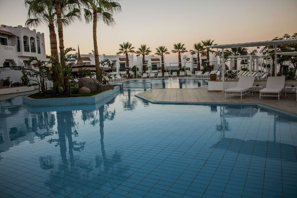 Glide into the quiet shallows and relax on plush loungers.