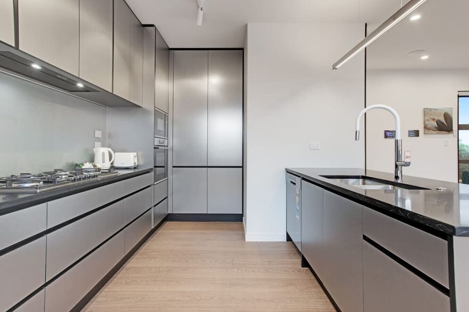 The kitchen has plenty of room to store your groceries if you are cooking meals for the family.