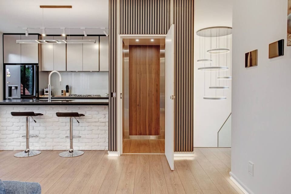 The lift that runs throughout the floors is in the centre of the house.
