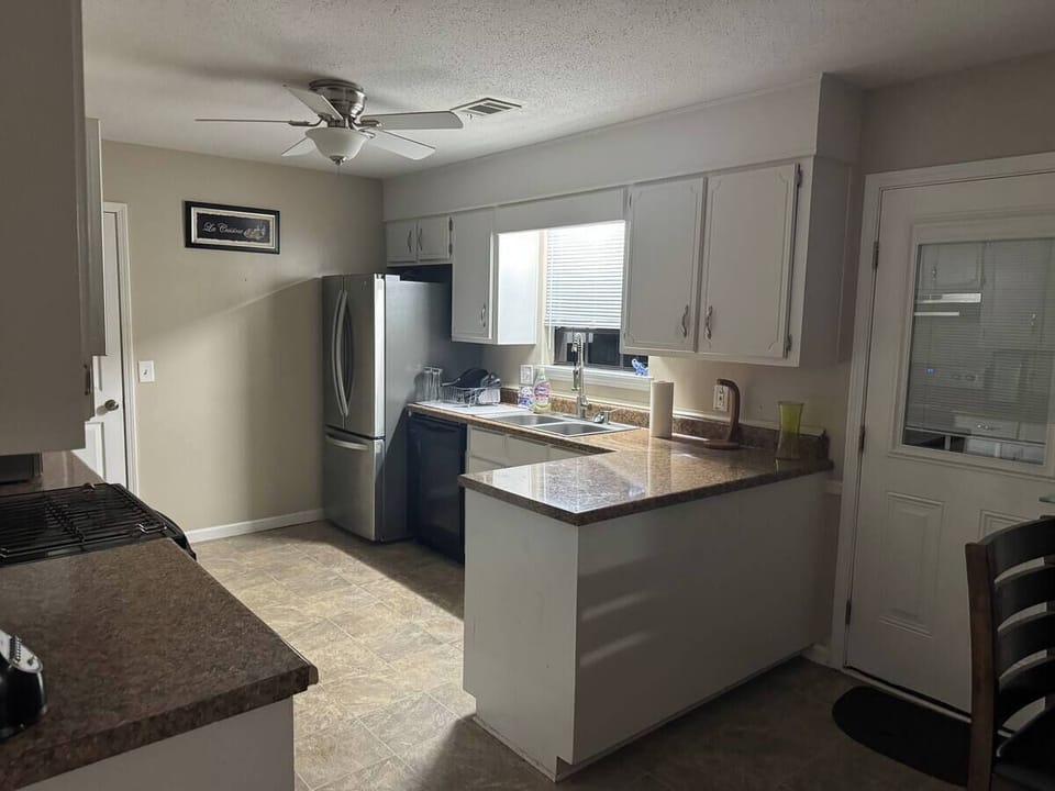 Kitchen . Large prep area . New stainless steel refrigerator 