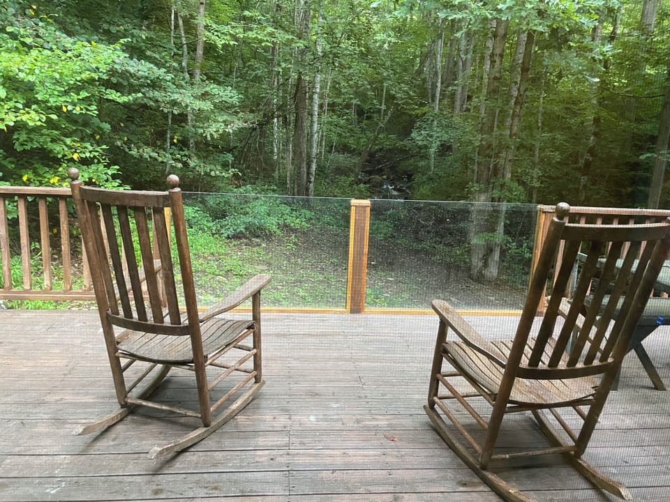 Enjoy our glass pa el view of the creek!