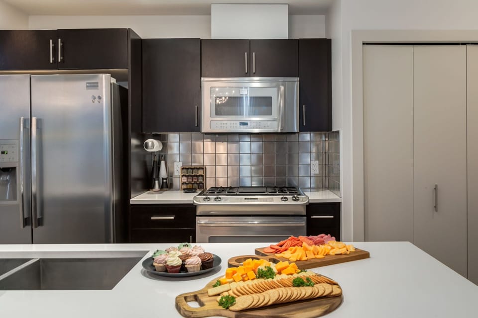 Chef's kitchen with gas range and premium cookware