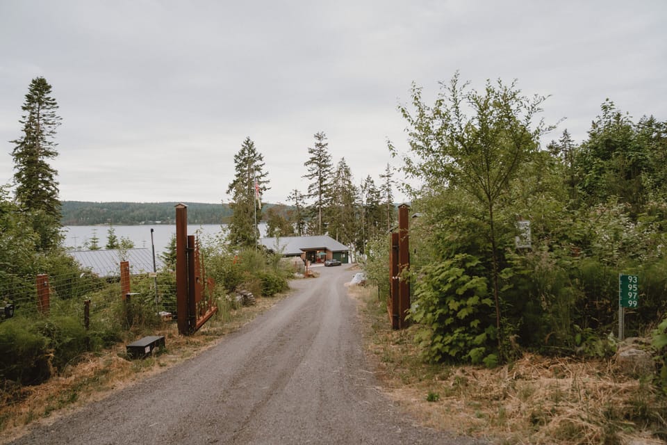 Driveway in to the complex.  Owner's home is shown here with rental to the right