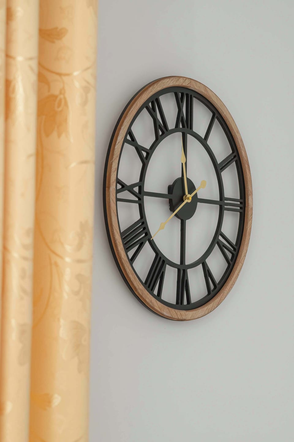 Decorative wall clock adding charm to the living area.