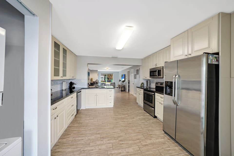 Spacious kitchen, fridge with generous ice dispenser.