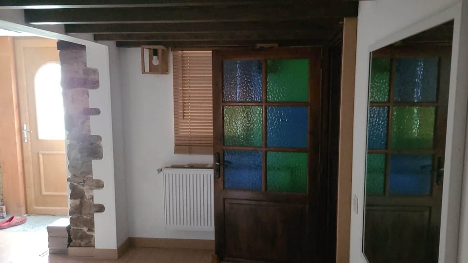 Kitchen corner with view toward stained glass bathroom doors.jpg