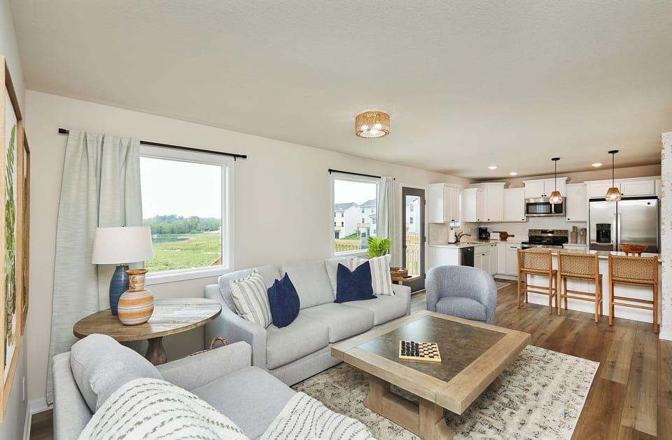 Living room on main level with l;ots of natural light and great views. 50" TV