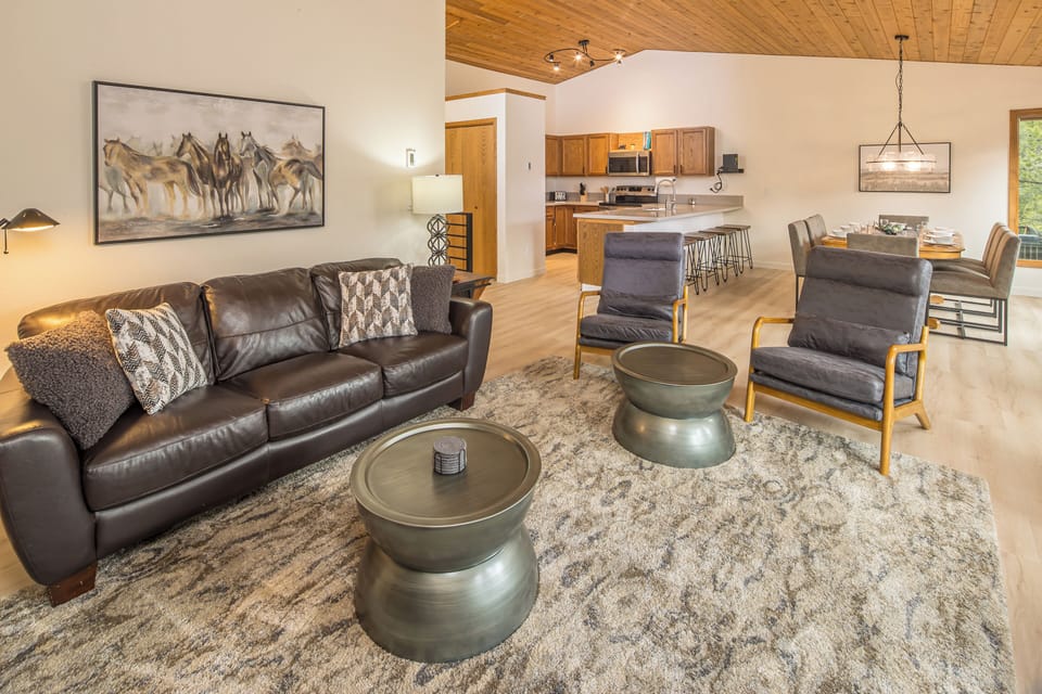 Cozy living room with fire place and plenty of comfortable seating