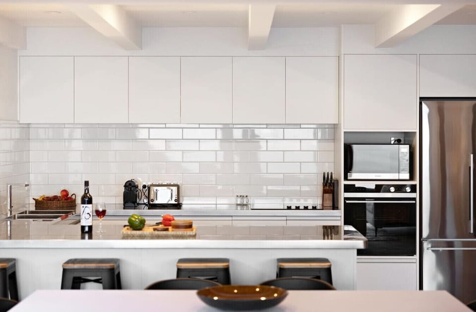 Chef ready kitchen with premium appliances, Nespresso coffee and lake views while you cook
