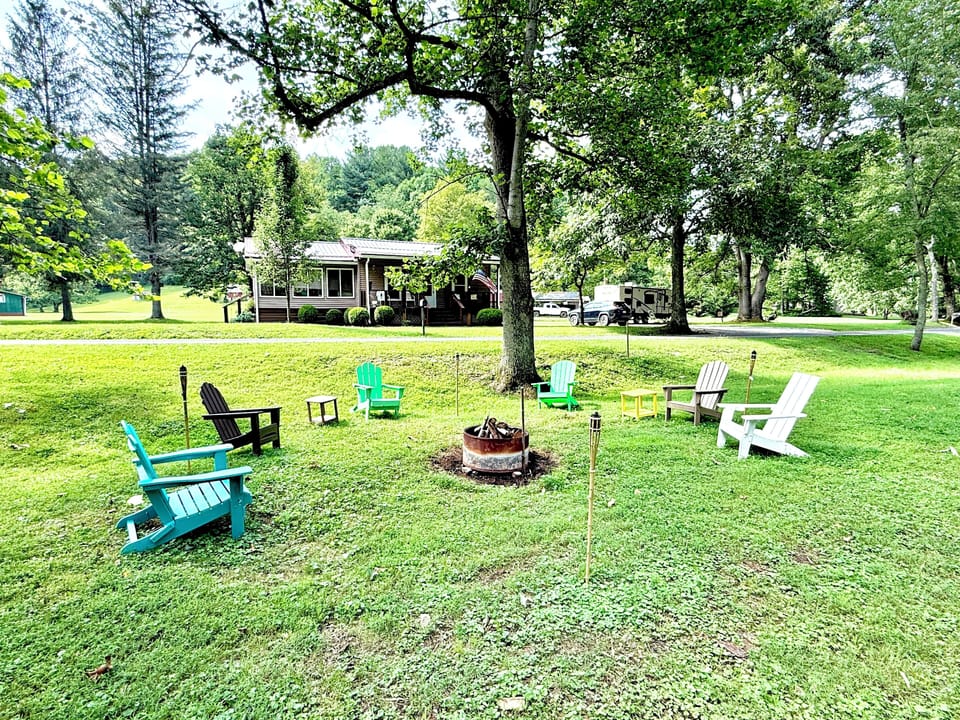 Fire-pit and Adirondack chairs for your use and enjoyment.