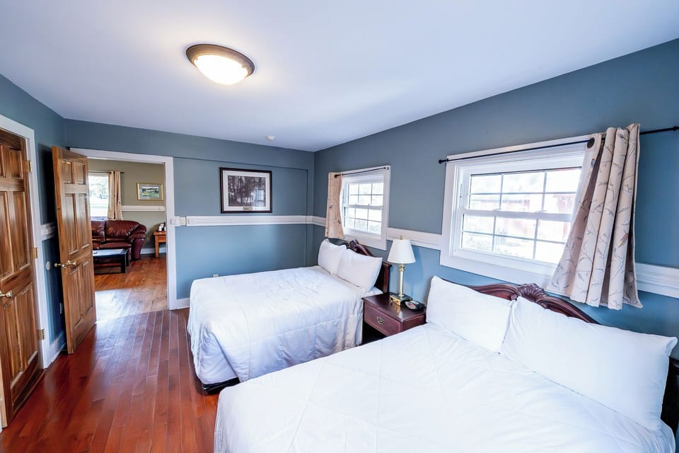 Drift off easily in a tidy room with crisp linens.