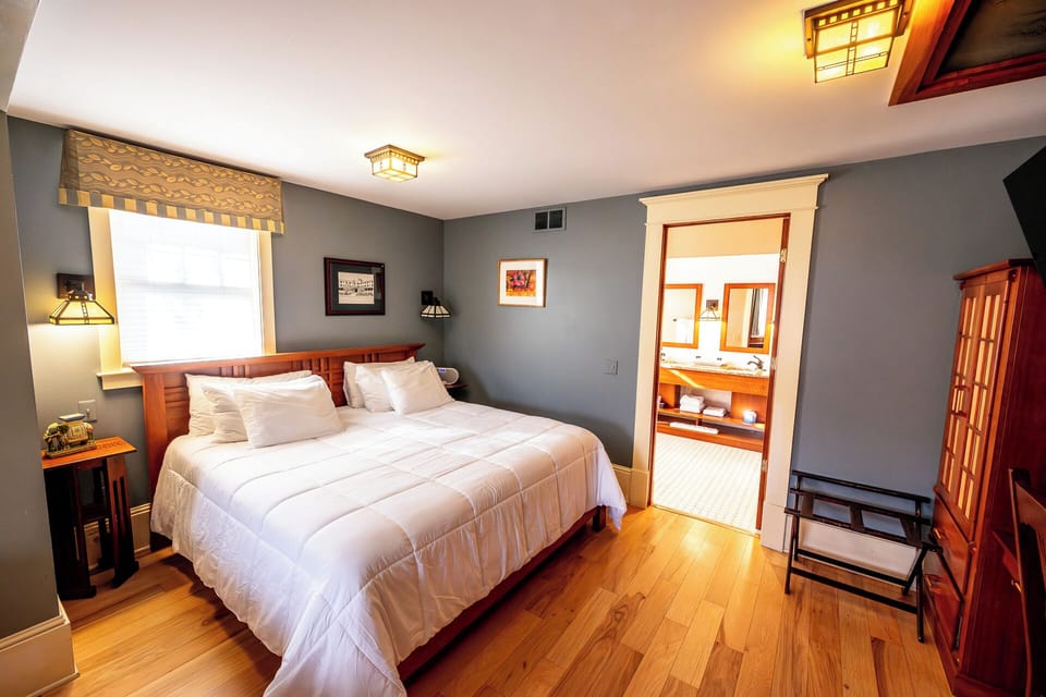 Refresh easily with convenient ensuite access beside your king bed