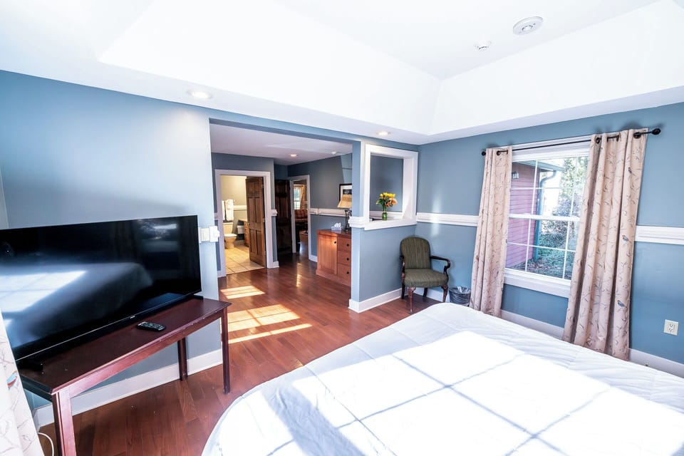 Wake up to daylight spilling across warm hardwood floors.