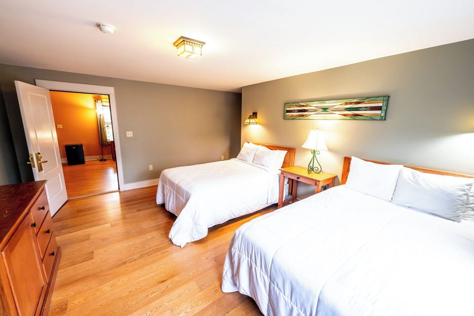 Drift off on crisp linens in a calm, spacious room.