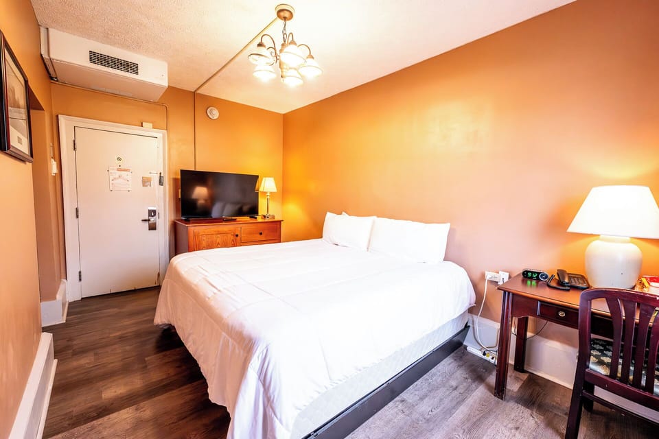 Drift off comfortably with bedside lighting and in-room TV