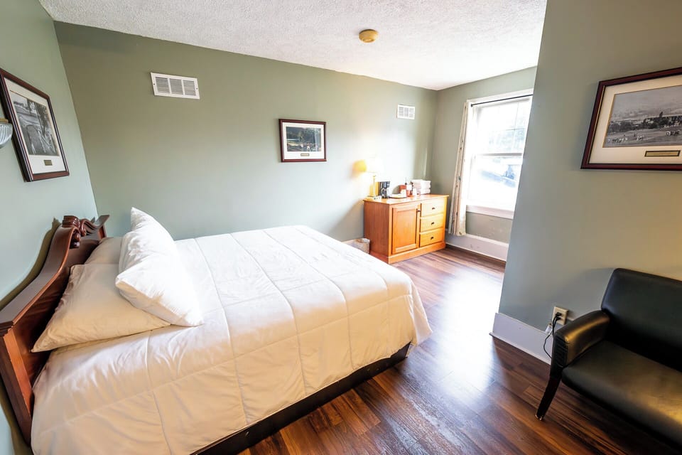 Drift off in a quiet corner room with natural daylight.
