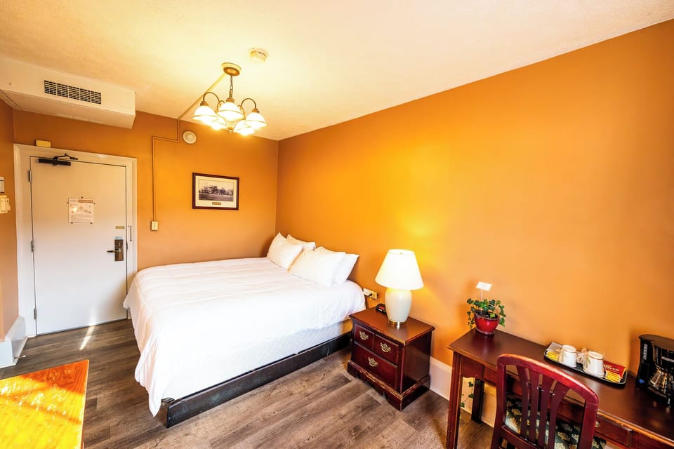 Settle in with roomy comfort and a convenient in-room coffee station.