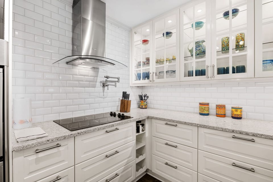 Sleek, spotless, and fully stocked—this corner of the kitchen is made for serious cooks and casual meals alike.