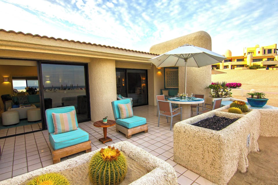 Outdoor oasis. Private patio with fire pit & seating. 
