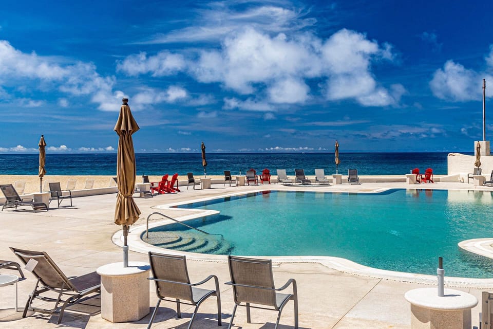 Dive into paradise! Stunning oceanfront pool awaits.