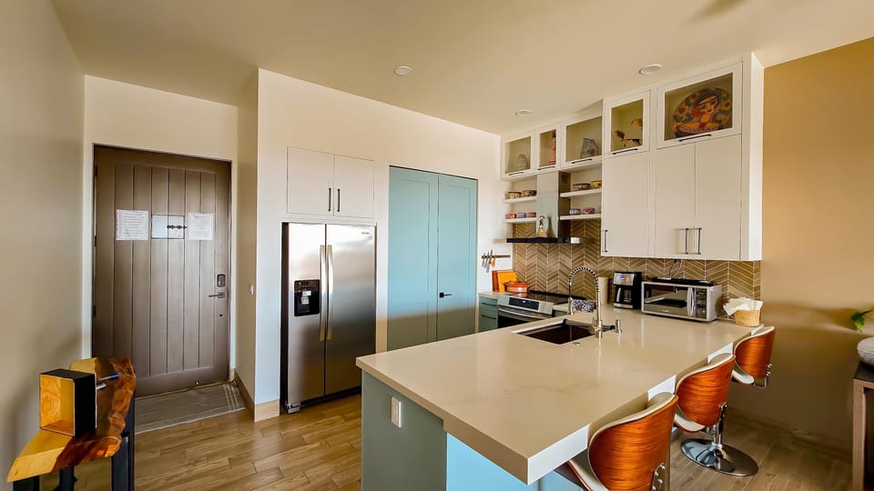 Prepare and share meals in the bright kitchen.