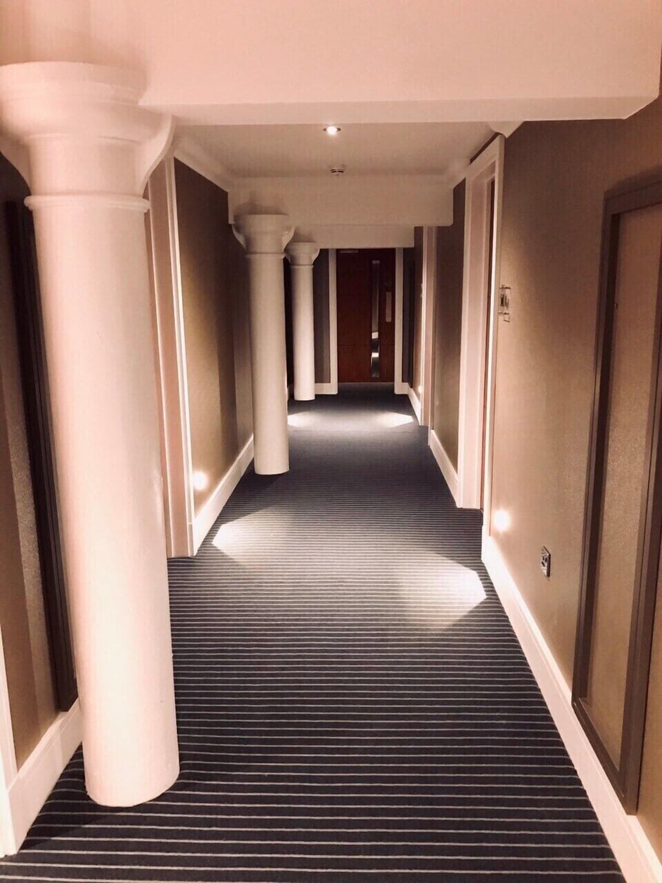 First floor landing with original steel pillars