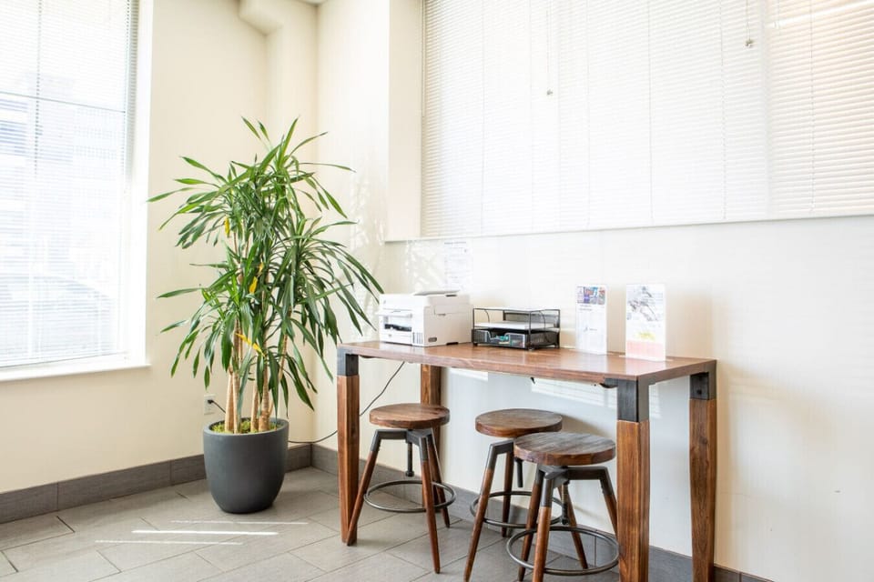 Share building lounge and kitchen area with free coffee and printer