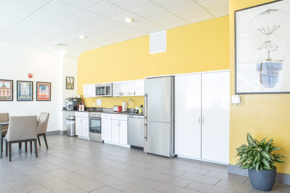 Share building lounge and kitchen area with free coffee and printer