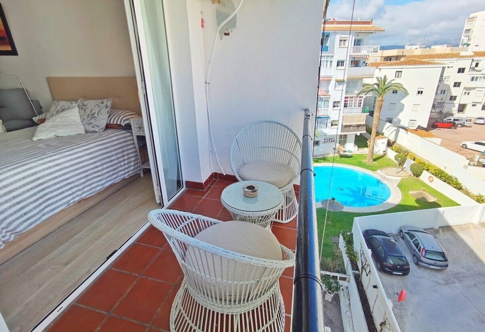 Private Balcony with view to communal pool