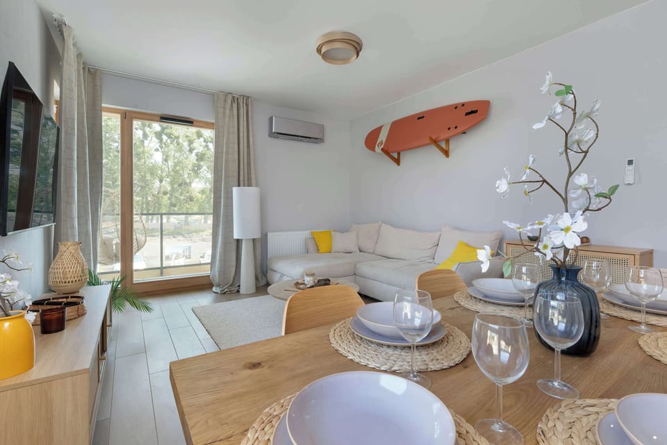 The bedrooms' modern amenities ensure a comfortable stay.