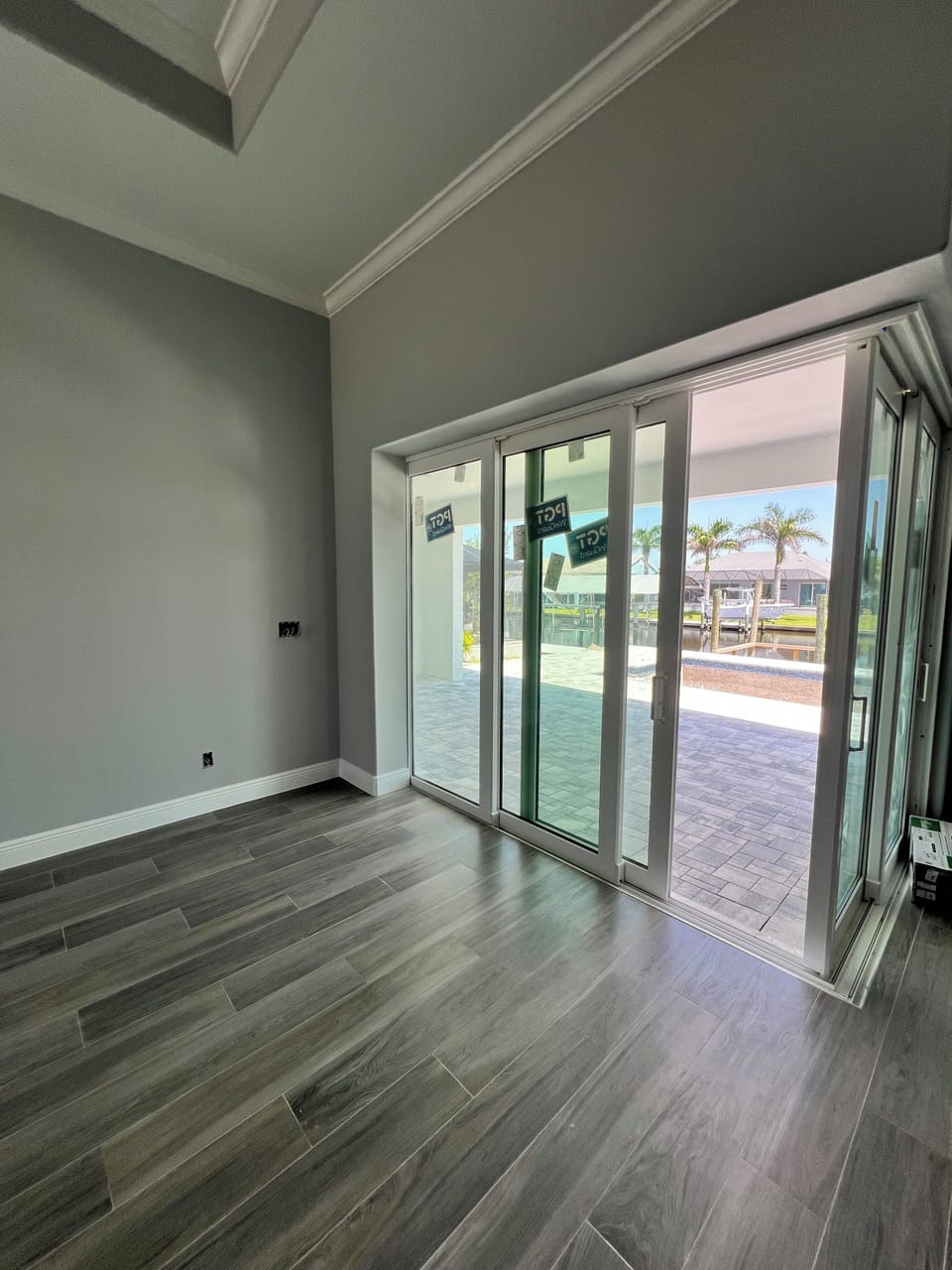 Living Room view to Patio with corner sliding glass door 
