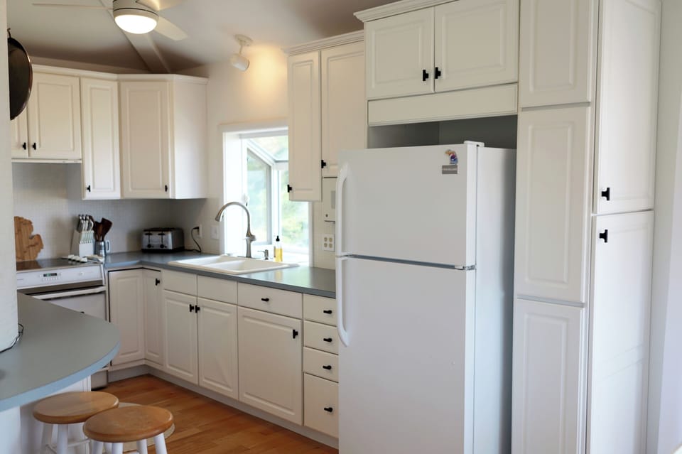 Bright, fully equipped kitchen for easy vacation meals.