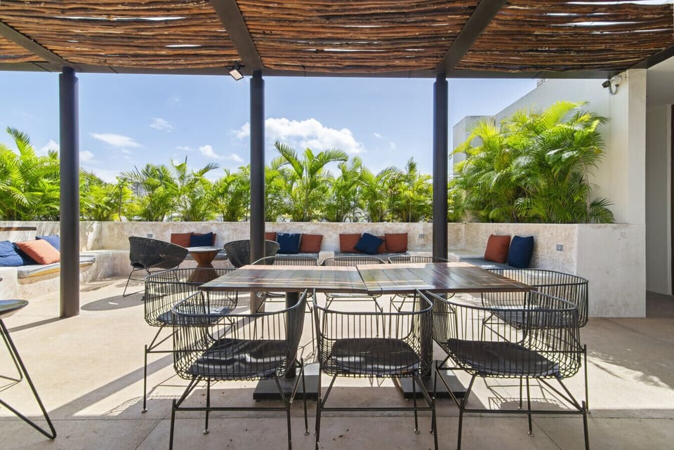 Unwind on our rooftop with cozy seating and stunning panoramic views.