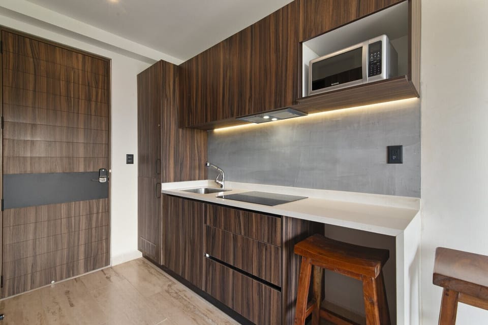 Modern kitchen with cozy decor and all you need to cook with ease.