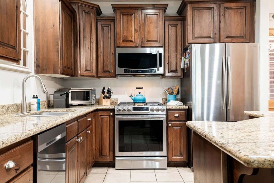 Fully equipped kitchen with stainless steel appliances