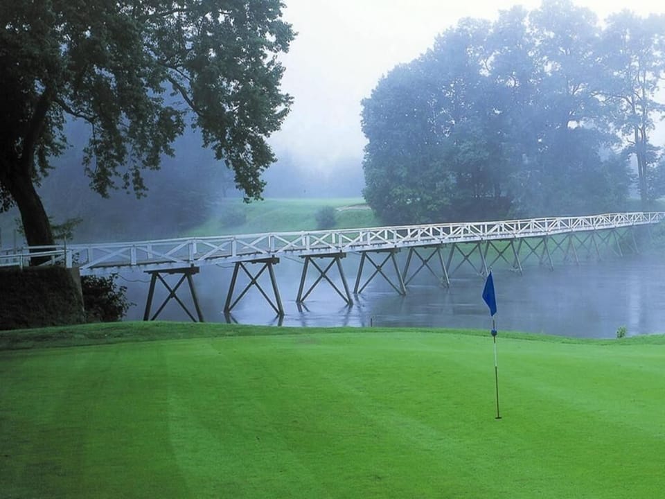 Arrive to sweeping resort views framed by lush green fairways.