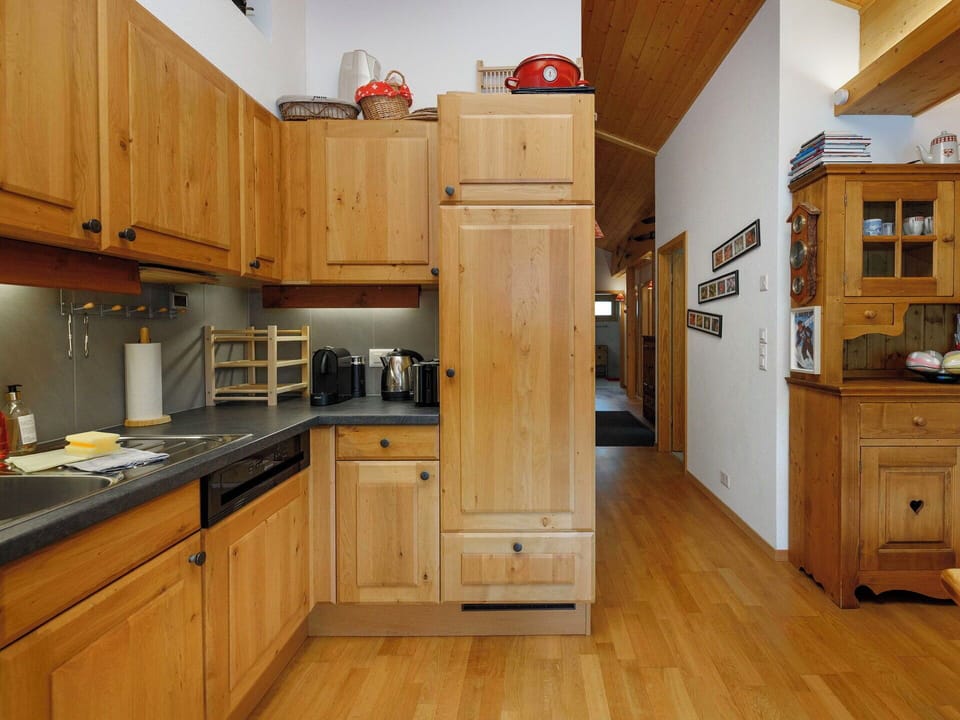 Furniture, Kitchen, Cabinetry, Wood, Countertop, Flooring, Kitchen Appliance, Interior Design, Floor, Major Appliance